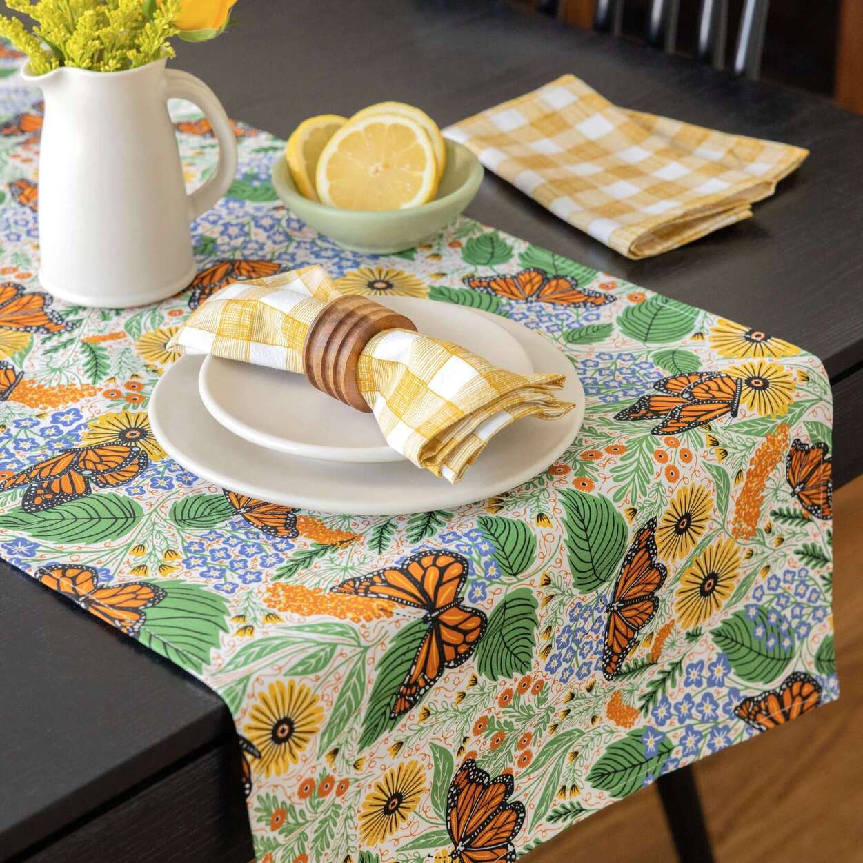 Monarch Garden table runner by Gingiber styled on a Memorial Day tablescape with fresh florals and fresh lemons