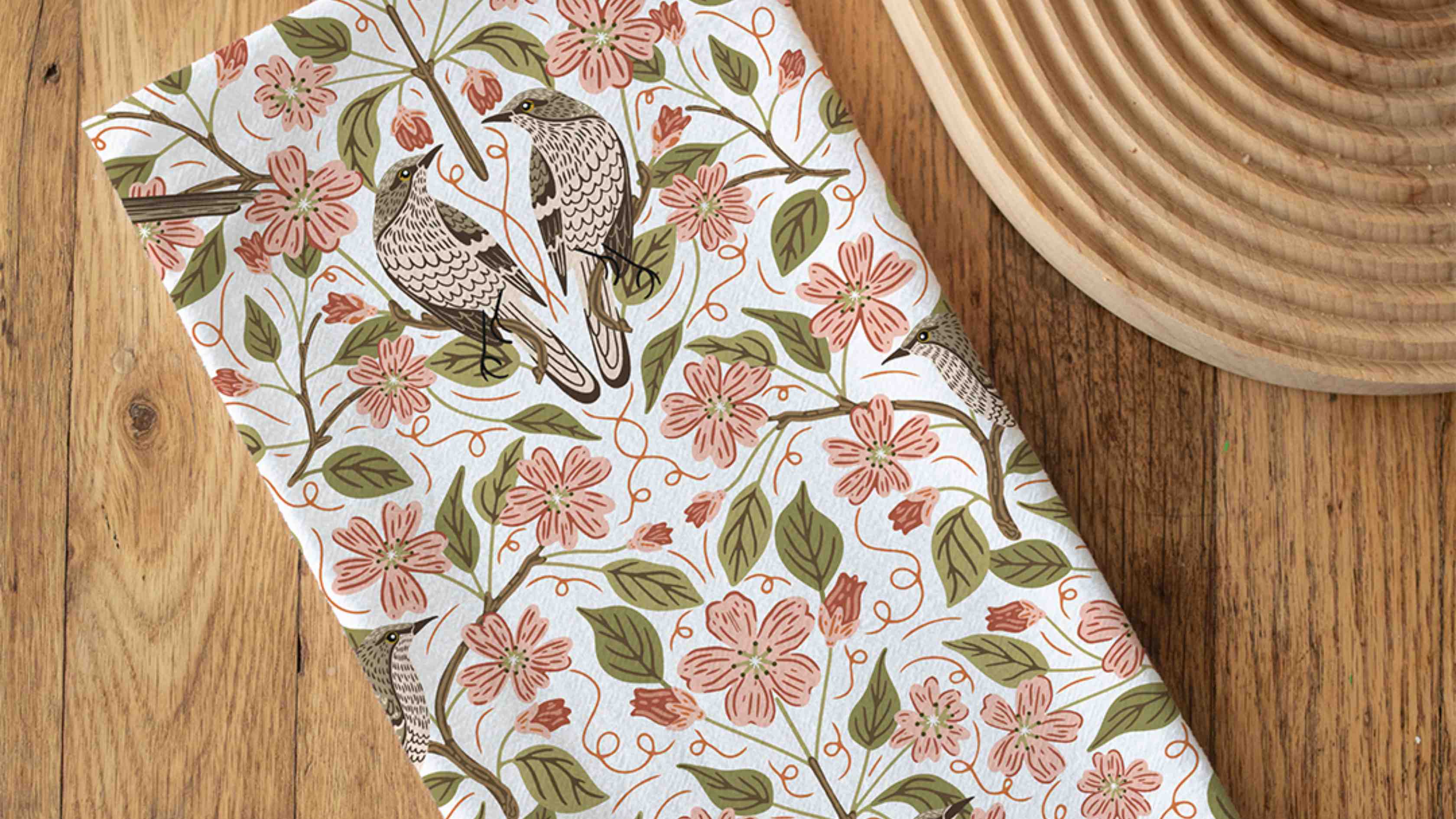 Apple Blossom Tea Towel — illustrated tea towel tucked in tissue paper as a bridal shower gift