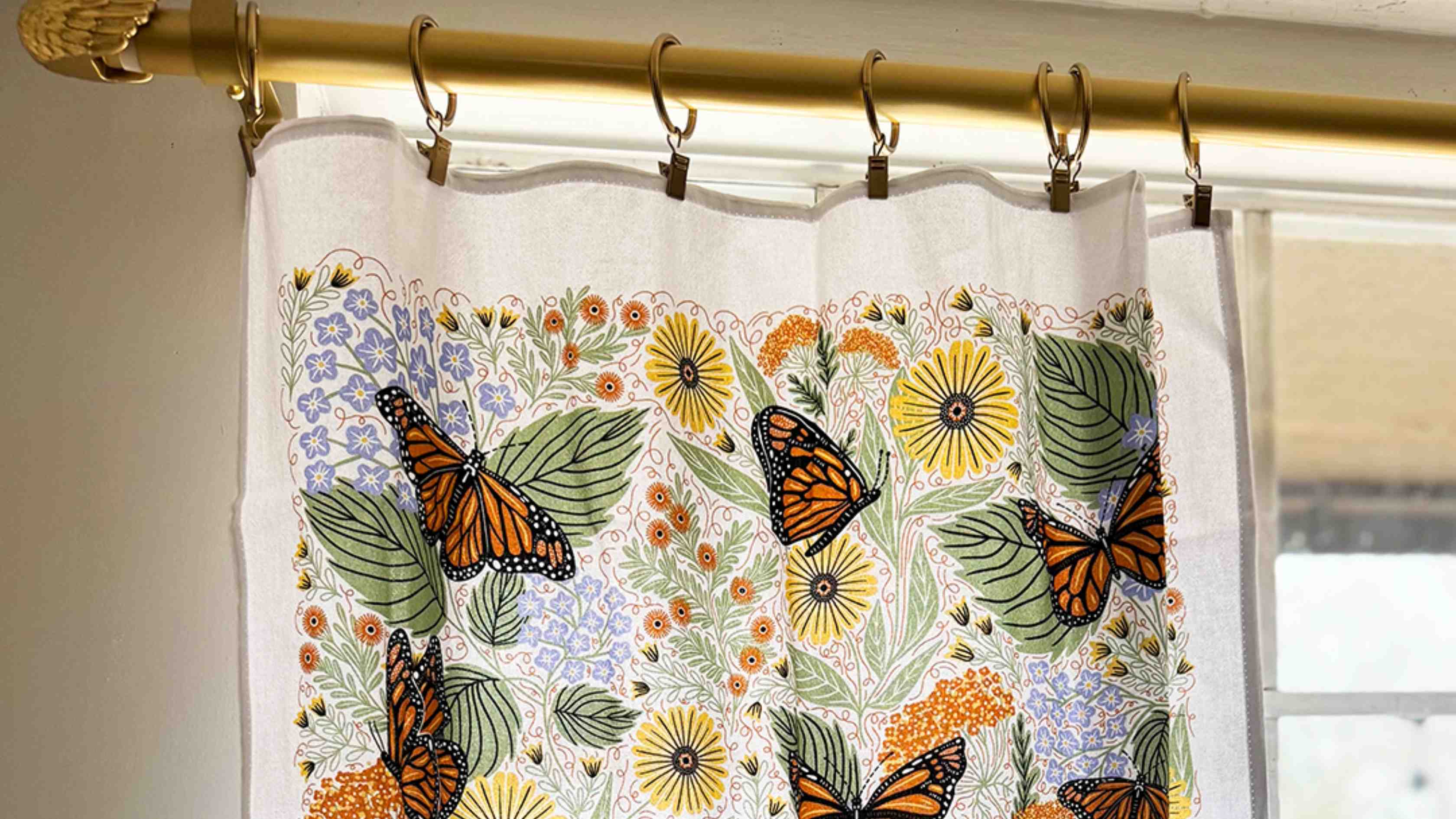 Monarch Garden Cafe Curtains by Gingiber — hung as a damage-free café curtain in a rental kitchen window