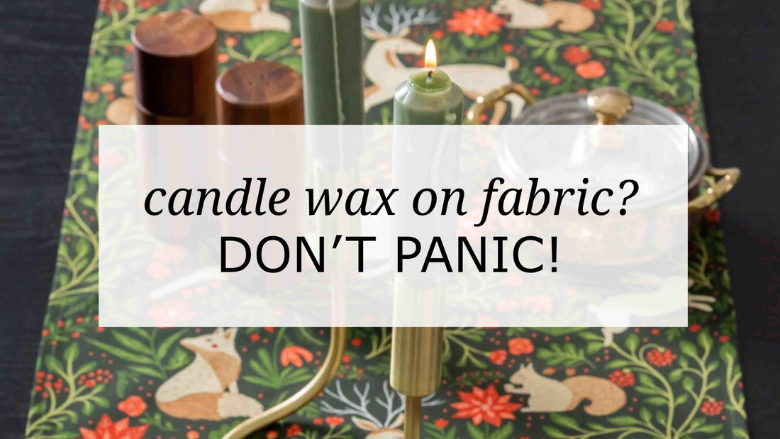 Candle wax on a patterned Gingiber table runner with green taper candles and brass holders, styled table scene with text overlay reading “Candle wax 