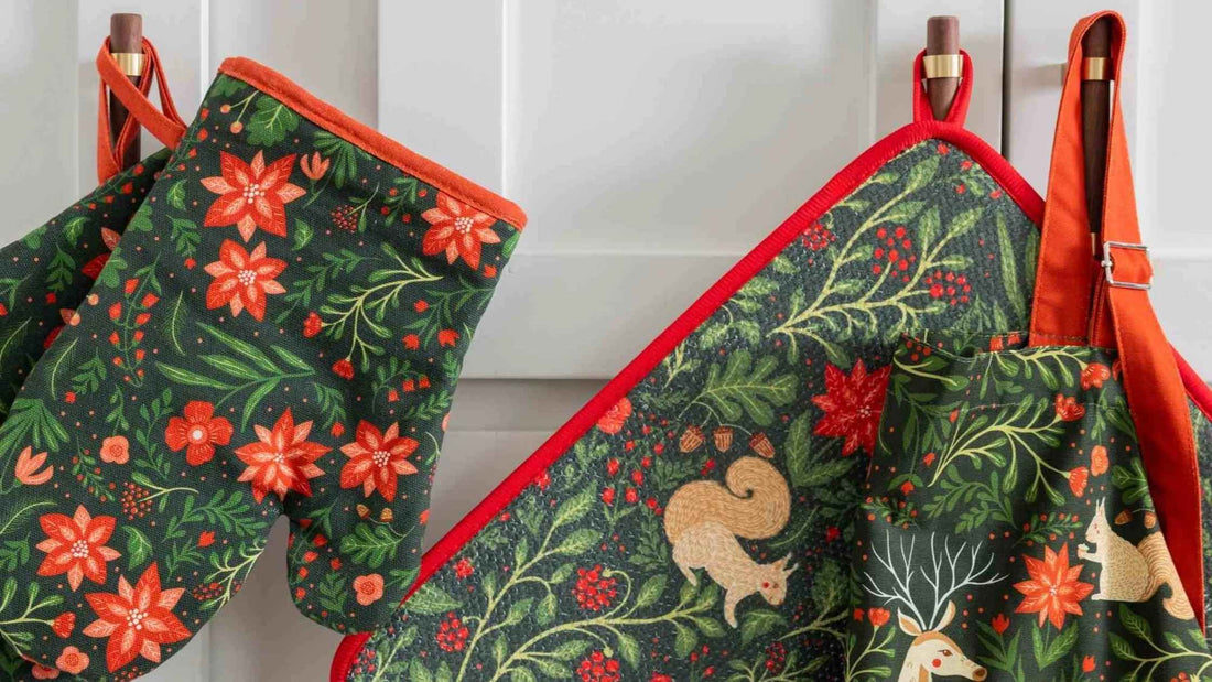 Gingiber Christmas Forest Kitchen Bundle with a festive oven mitt, potholder, and apron featuring woodland animals and holiday florals.