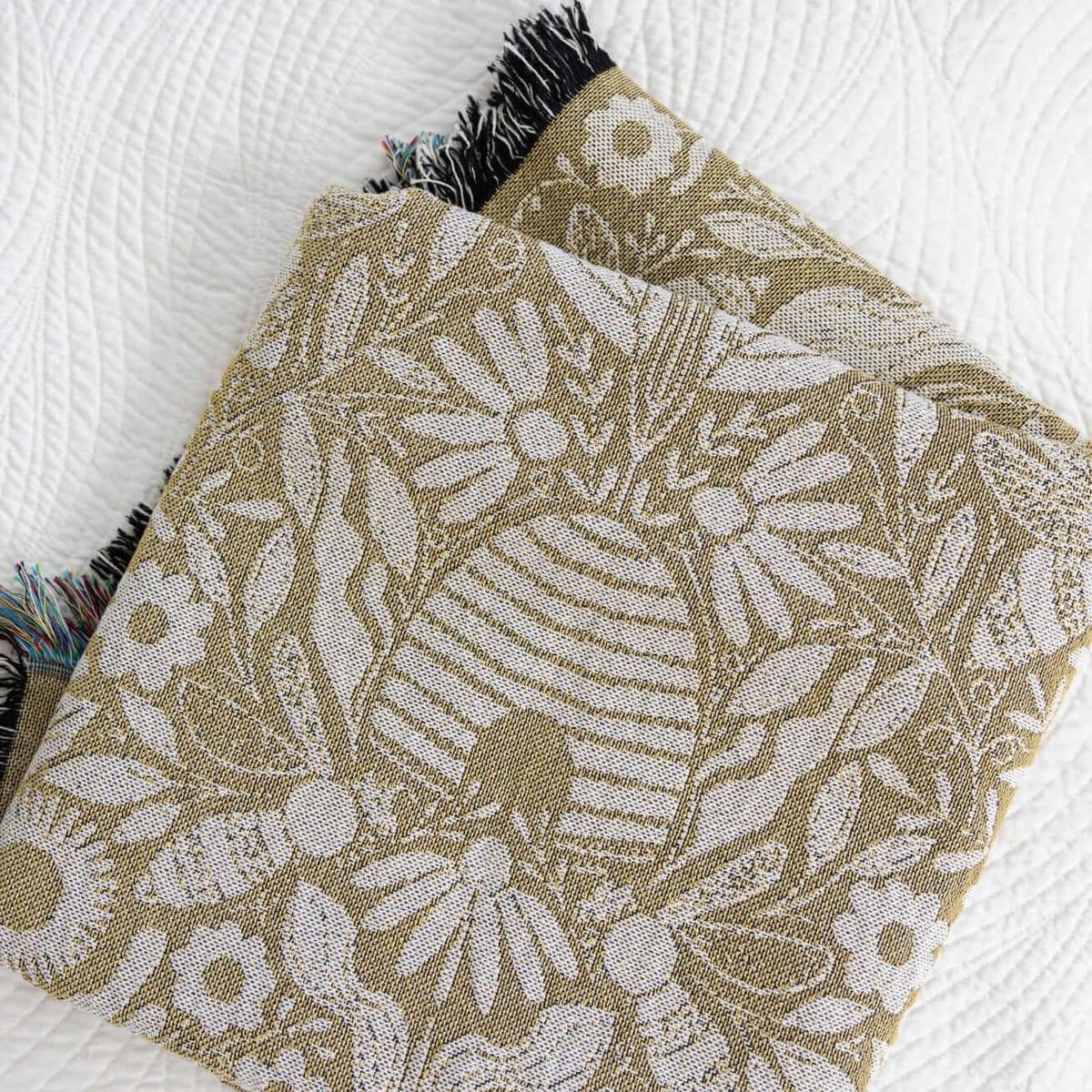 Blanket - woven throw featuring gold bee and beehive illustrations