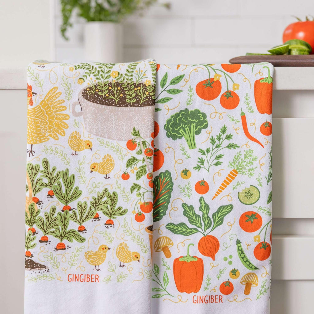 tea towel bundle with illustrated vegetables, chickens, and garden details