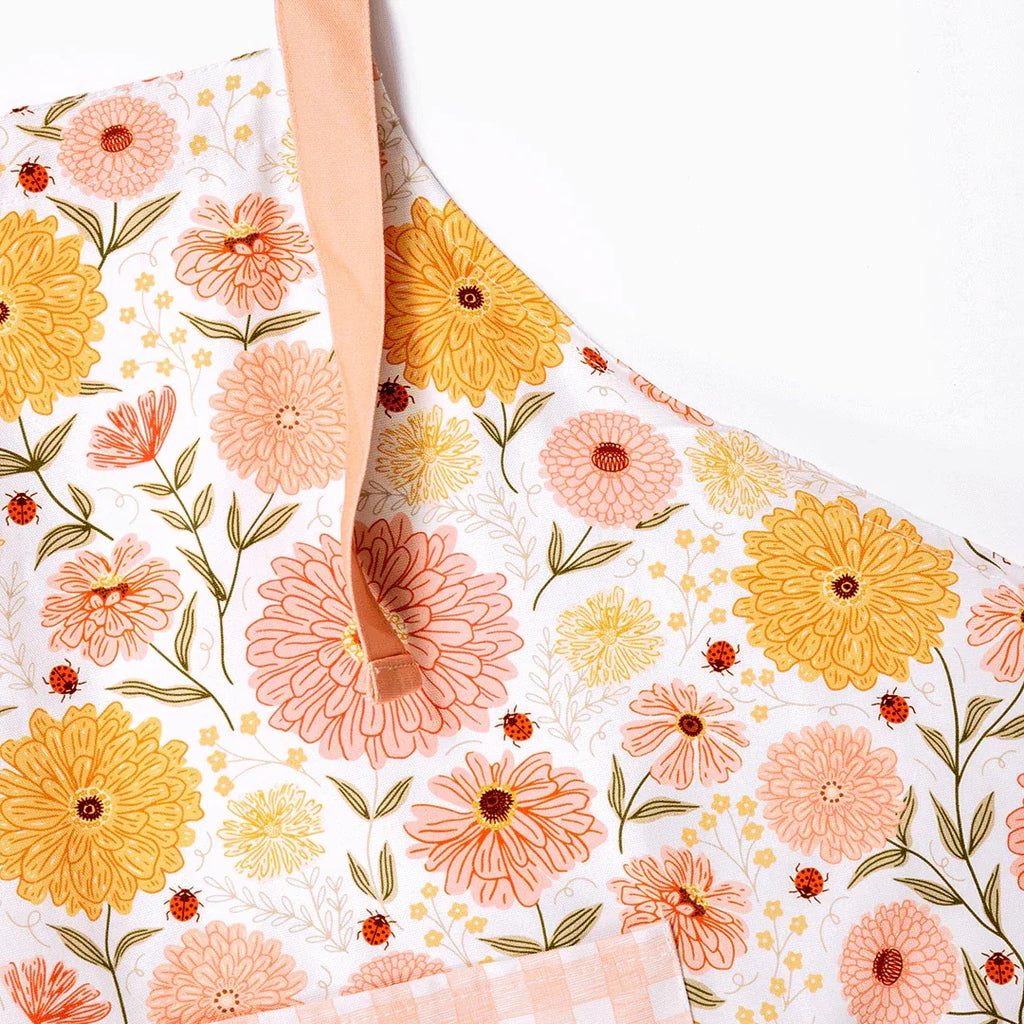 Zinnia Apron with gingiber floral print, adjustable neck strap, large pocket, and 100% cotton canvas – Zinnia Apron