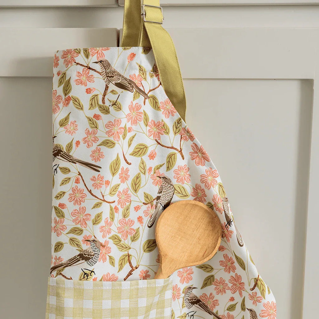 Apple Blossom Apron - Gingiber design with birds and pink blossoms, adjustable neck strap, front pocket, 100% cotton canvas, one size