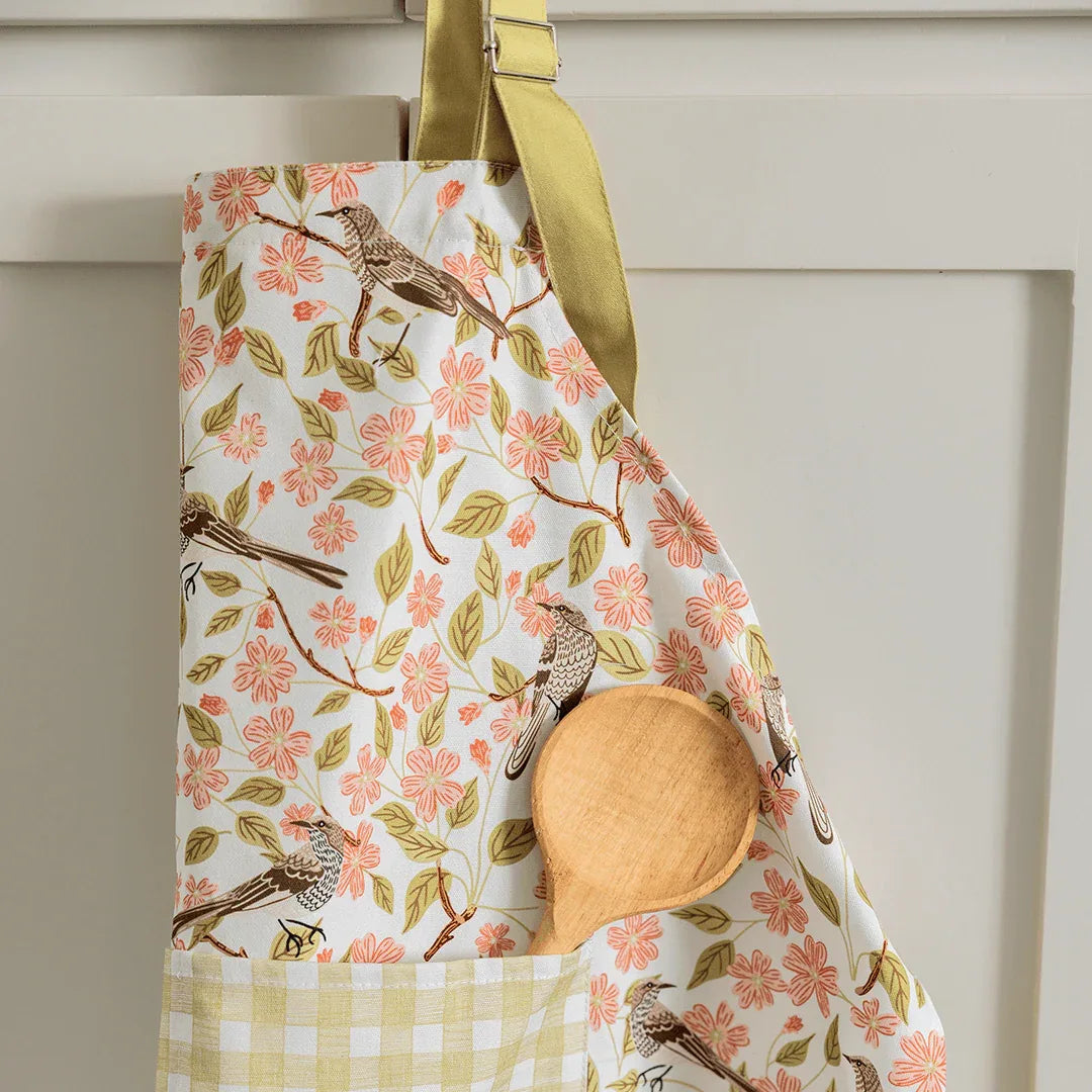 Apple Blossom Apron - Gingiber design with birds and pink blossoms, adjustable neck strap, front pocket, 100% cotton canvas, one size