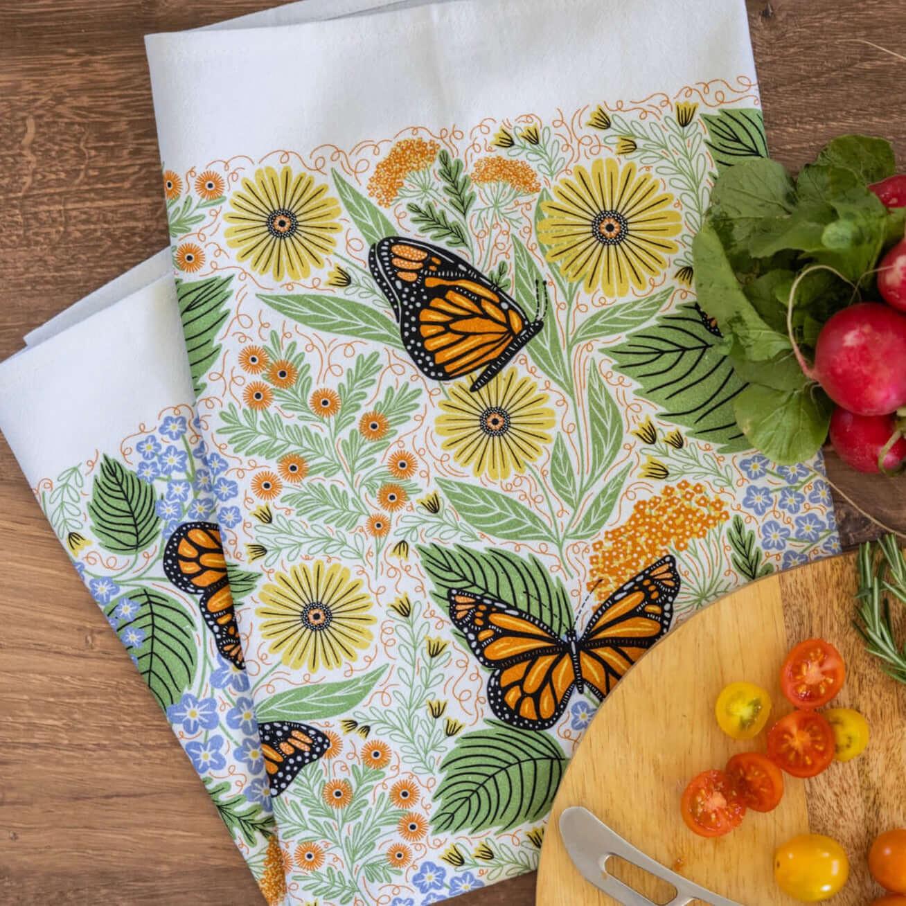 tea towel with illustrated butterfly and floral elements