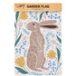 Garden flag with a rabbit design and floral elements on a white background