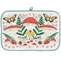 A square quilted potholder with a colorful woodland design featuring red and white mushrooms, green ferns, pink flowers, yellow flowers, and butterflies on an off-white background, finished with a mint green border and top loop.
