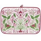 Floral patterned drying mat with green and pink design on a white background