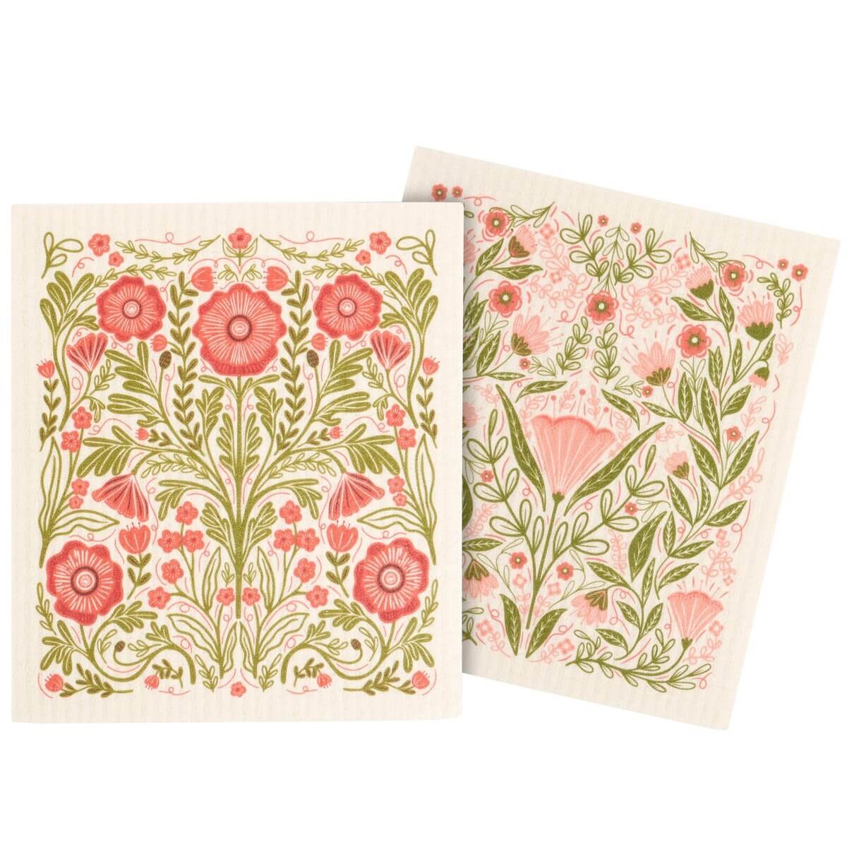 Two floral-patterned dish cloths with pink and green design on a white background