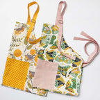 Apron - Gingiber floral apron with adjustable neck strap, large pocket, cotton canvas, 29" L x 26" W, tie back, 100% cotton, imported