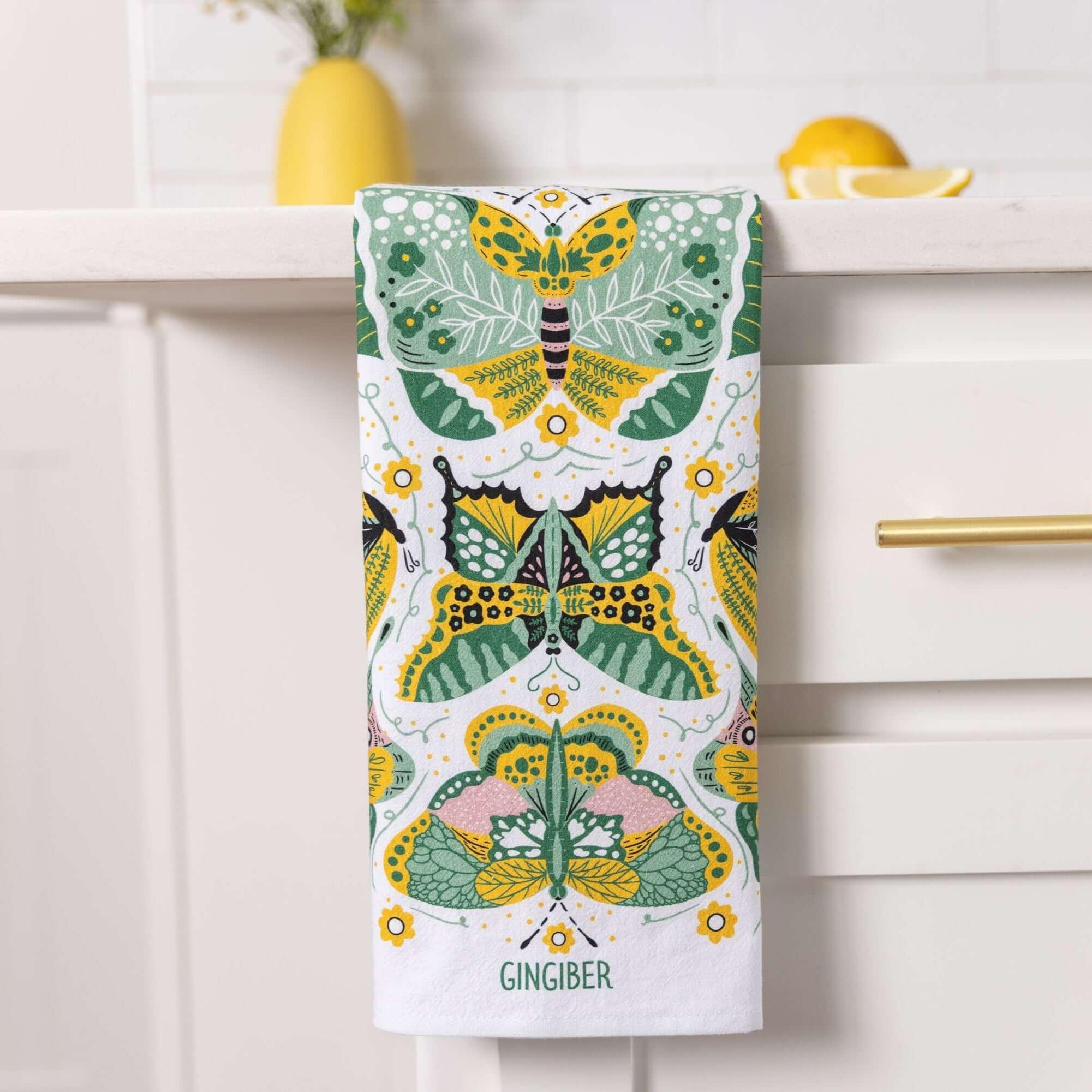 tea towel with butterfly and floral illustrations
