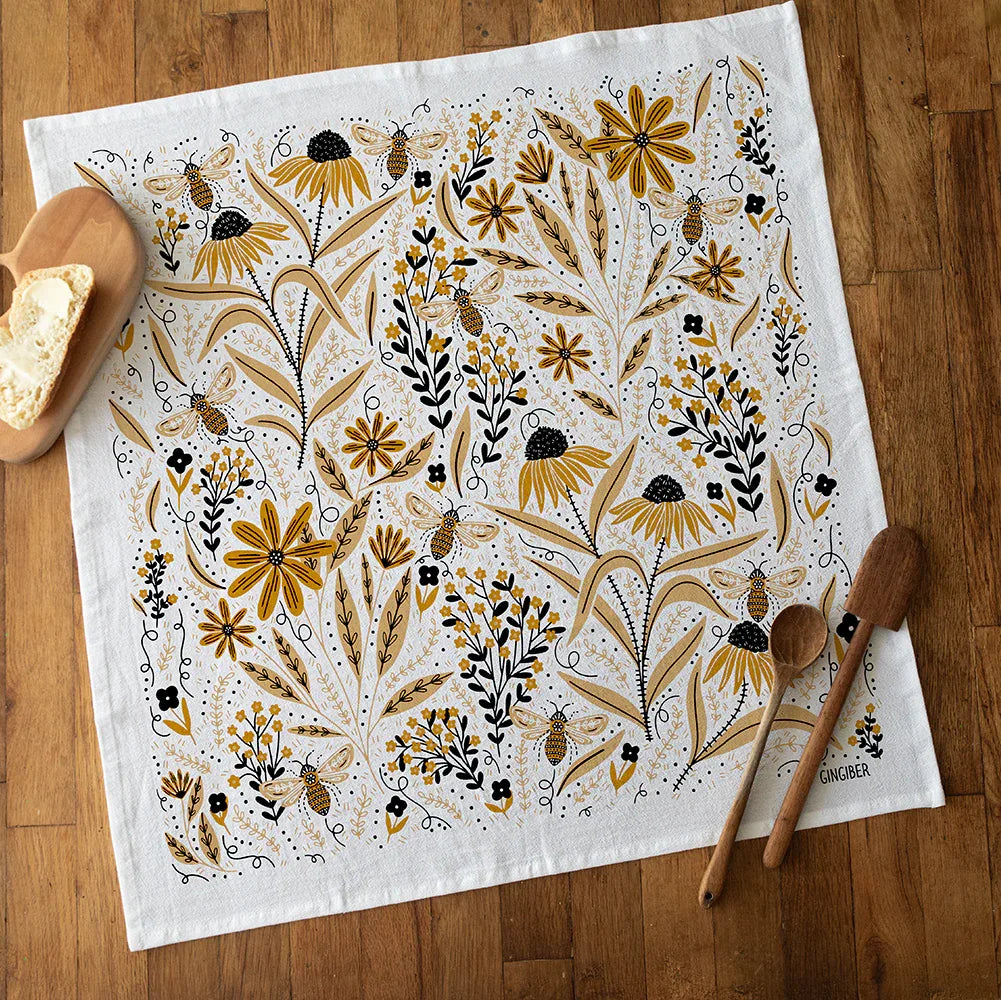 tea towel with illustrated bee and floral elements