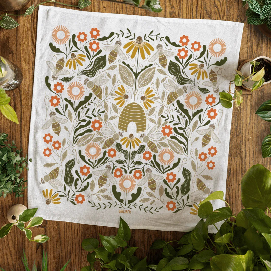 tea towel with illustrated bees and beehives