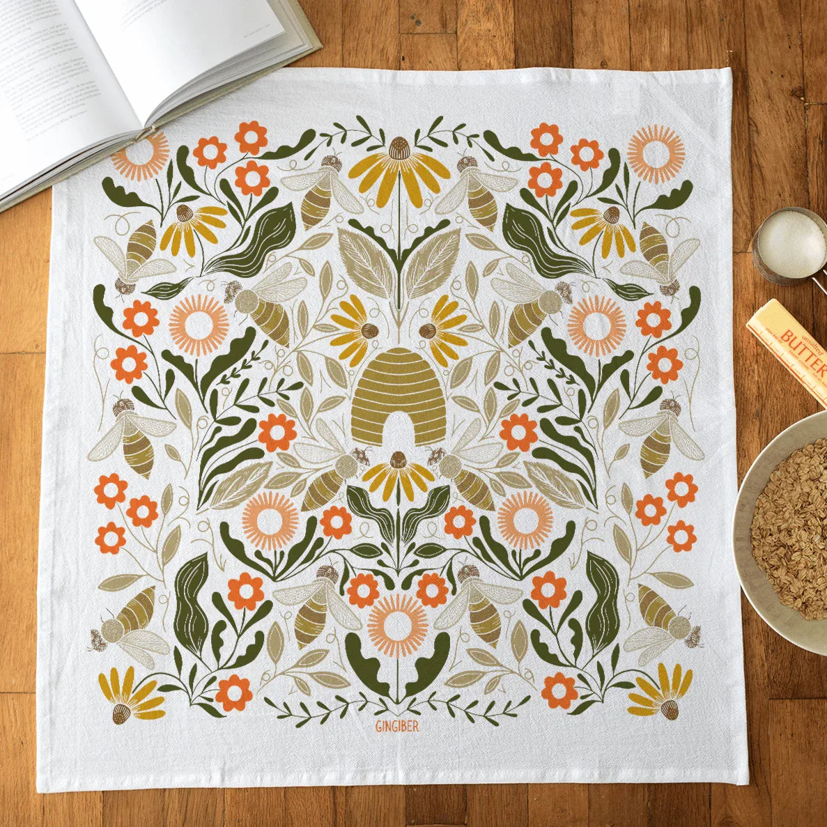 tea towel with illustrated bees and beehives