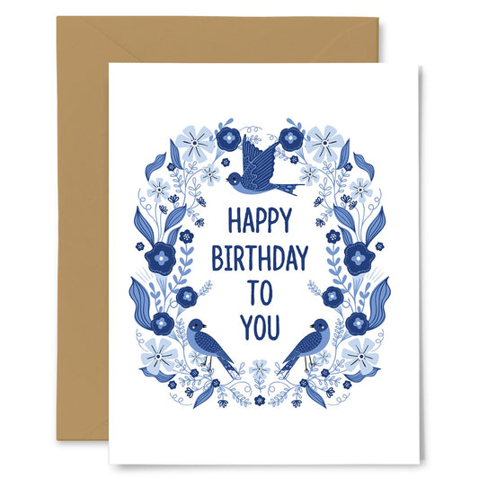 Greeting card with blue floral design and birds, featuring 'Happy Birthday To You' text.
