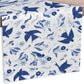 White fabric with blue bird and floral pattern