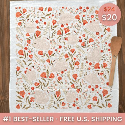 Floral patterned towel with ducks on a wooden surface, featuring a price tag and promotional text.