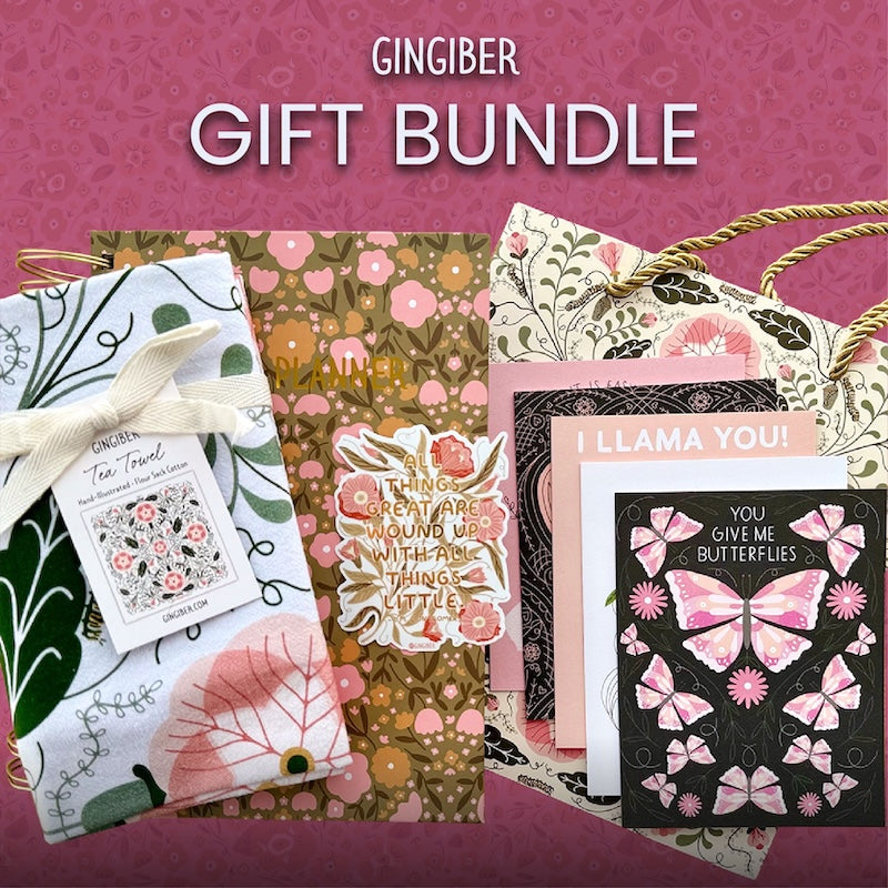 Gingiber gift bundle with various items on a pink floral patterned background