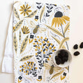 tea towel with illustrated bees and floral elements