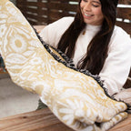 Blanket - woven throw featuring gold bee and beehive illustrations