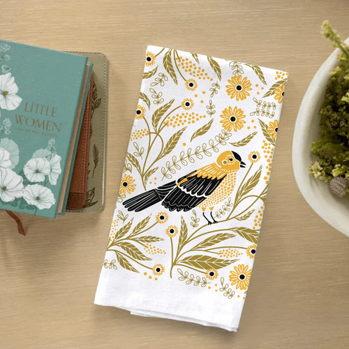 tea towel with illustrated birds and floral elements