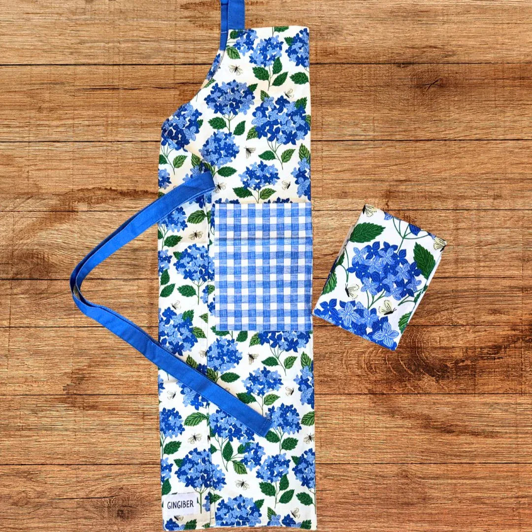 Hydrangea Apron—bake in style with gingiber apron featuring blue hydrangea print and matching tea towel,  adjustable neck strap, large pocket, 100% cotton canvas