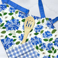 Hydrangea Apron—bake in style with gingiber apron featuring blue hydrangea print, adjustable neck strap, large pocket, 100% cotton canvas