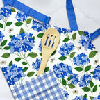 Hydrangea Apron—bake in style with gingiber apron featuring blue hydrangea print, adjustable neck strap, large pocket, 100% cotton canvas