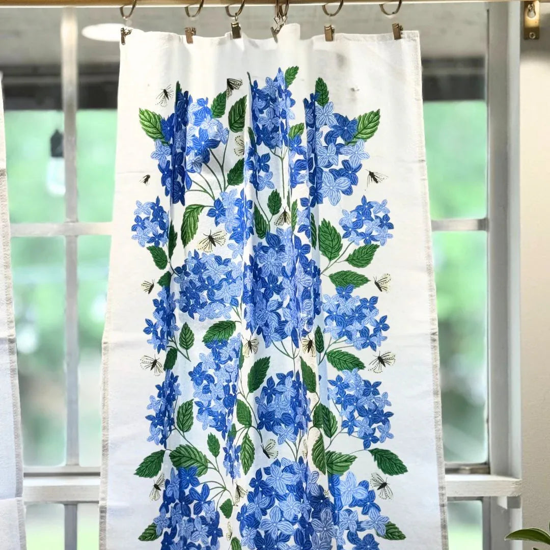 set of two tea towels with floral illustrations