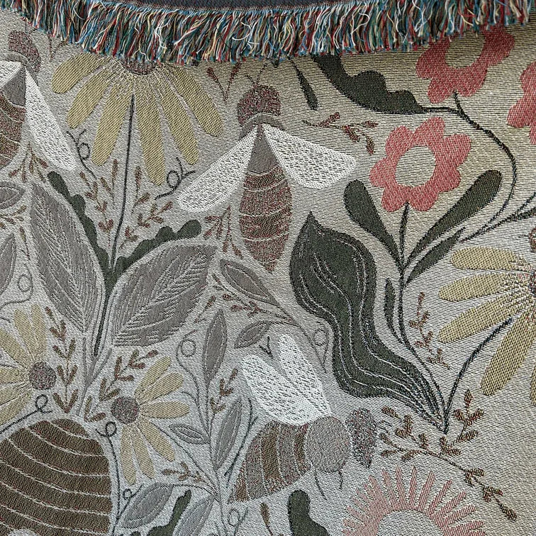 Blanket - woven throw featuring multicolored bee and beehive illustrations