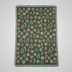 Christmas Cookies Blanket - woven throw with green background and cookie illustrations