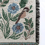 Blanket - woven throw featuring winter and forest animal illustrations on light background