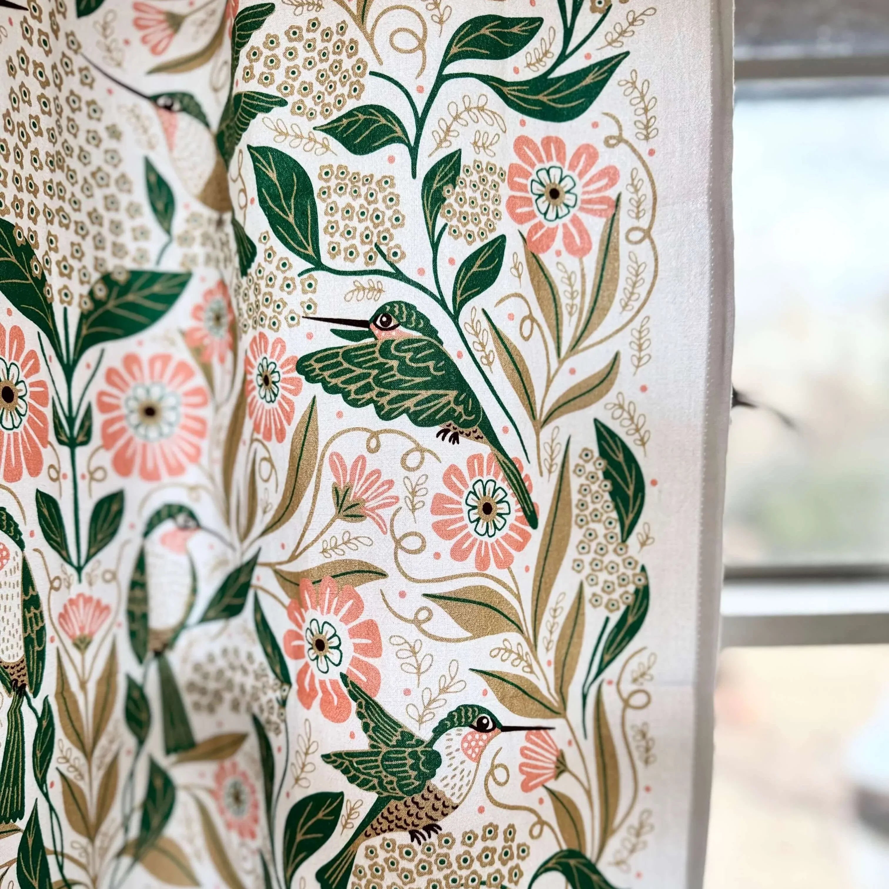 set of two tea towels with bird and floral illustrations