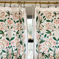 set of two tea towels with bird and floral illustrations
