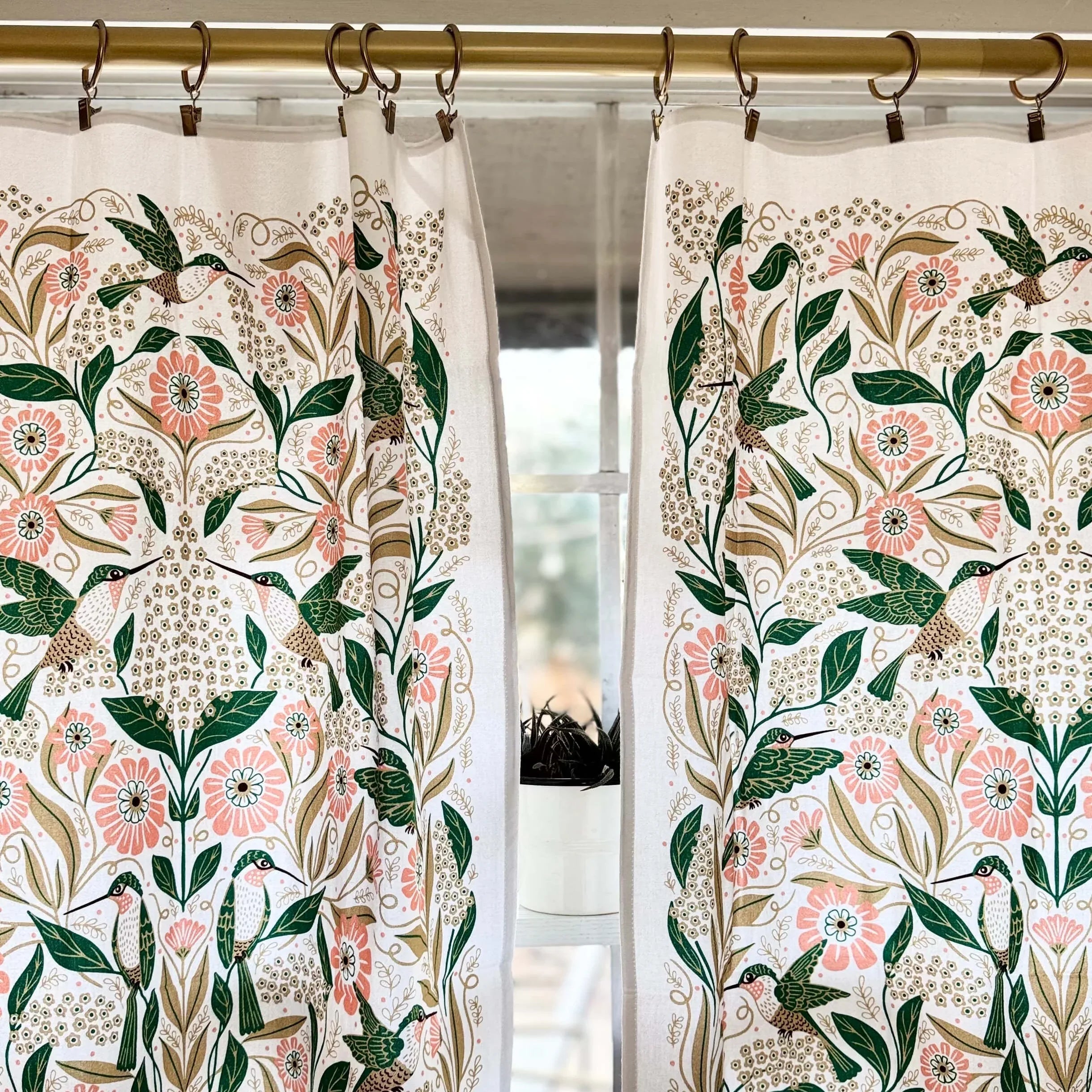set of two tea towels with bird and floral illustrations