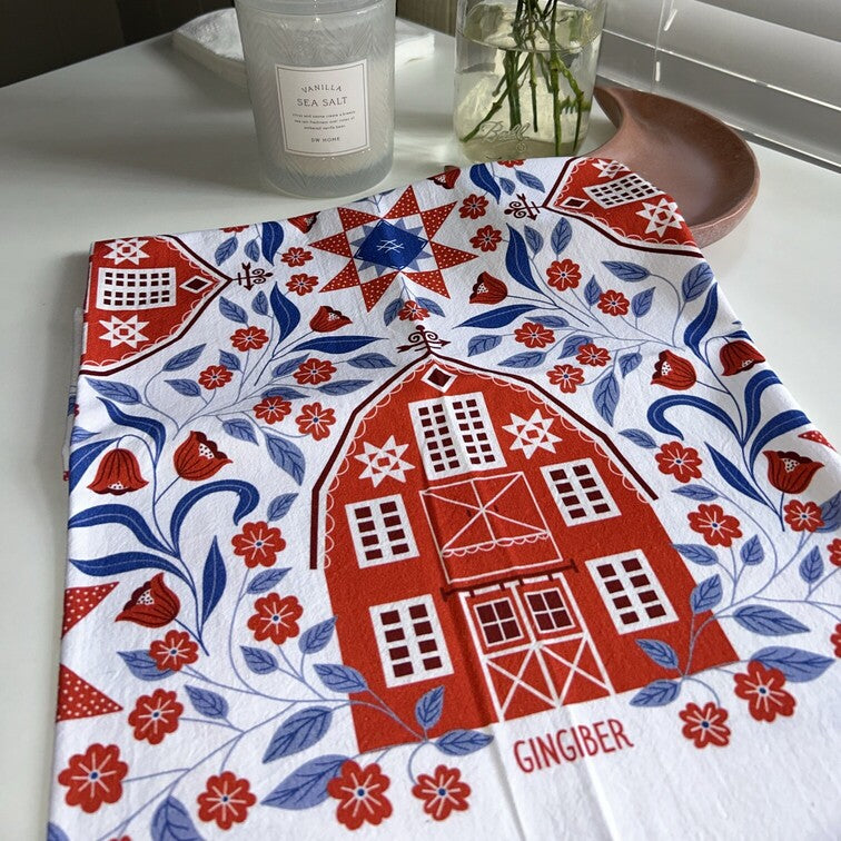 Decorative towel with red house design 
