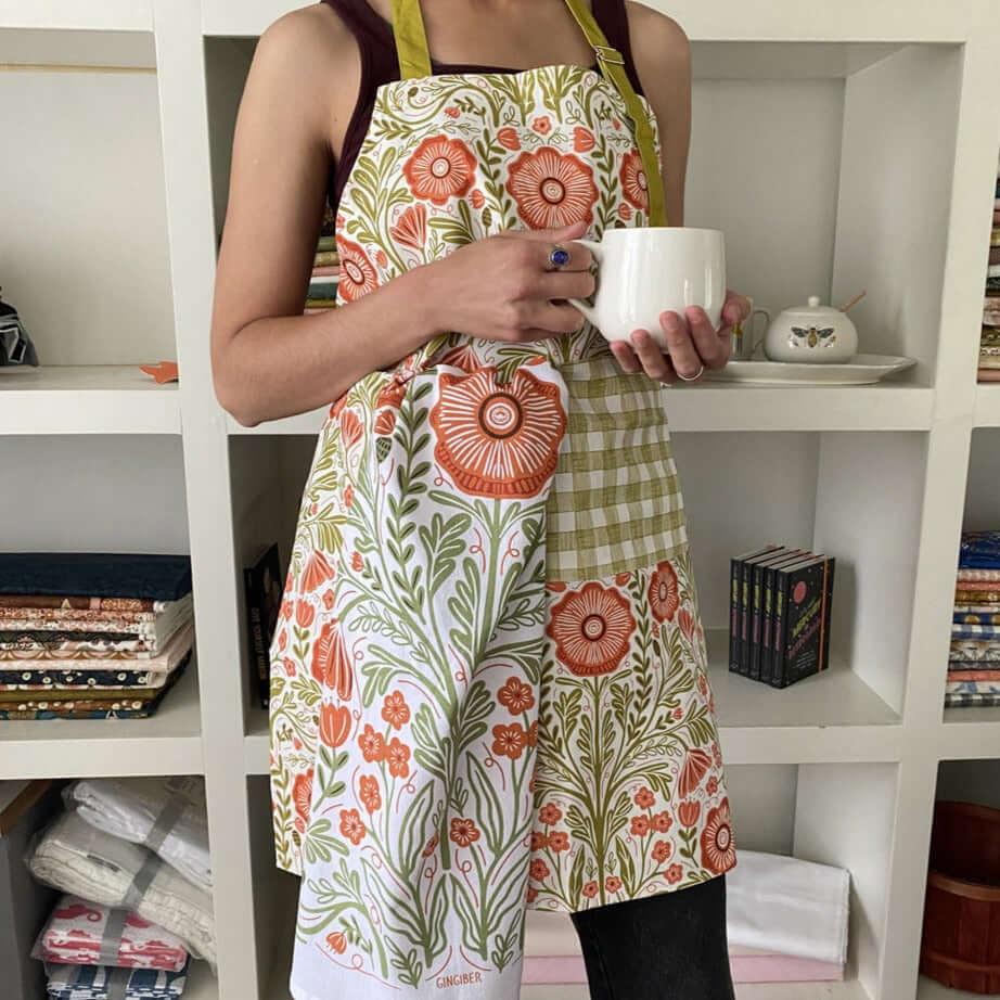 Poppy Apron & Tea Towel—bake in style with gingiber apron featuring poppy floral print and matching tea towel, adjustable neck strap, large pocket, 100% cotton canvas