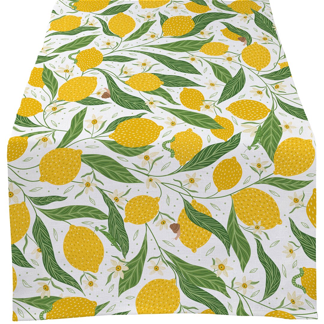 Fabric with a lemon and leaf pattern on a white background