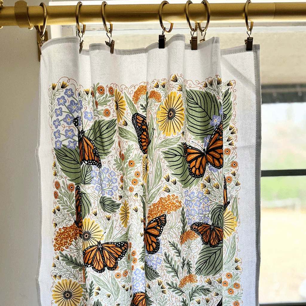 set of two tea towels with butterfly and floral illustrations