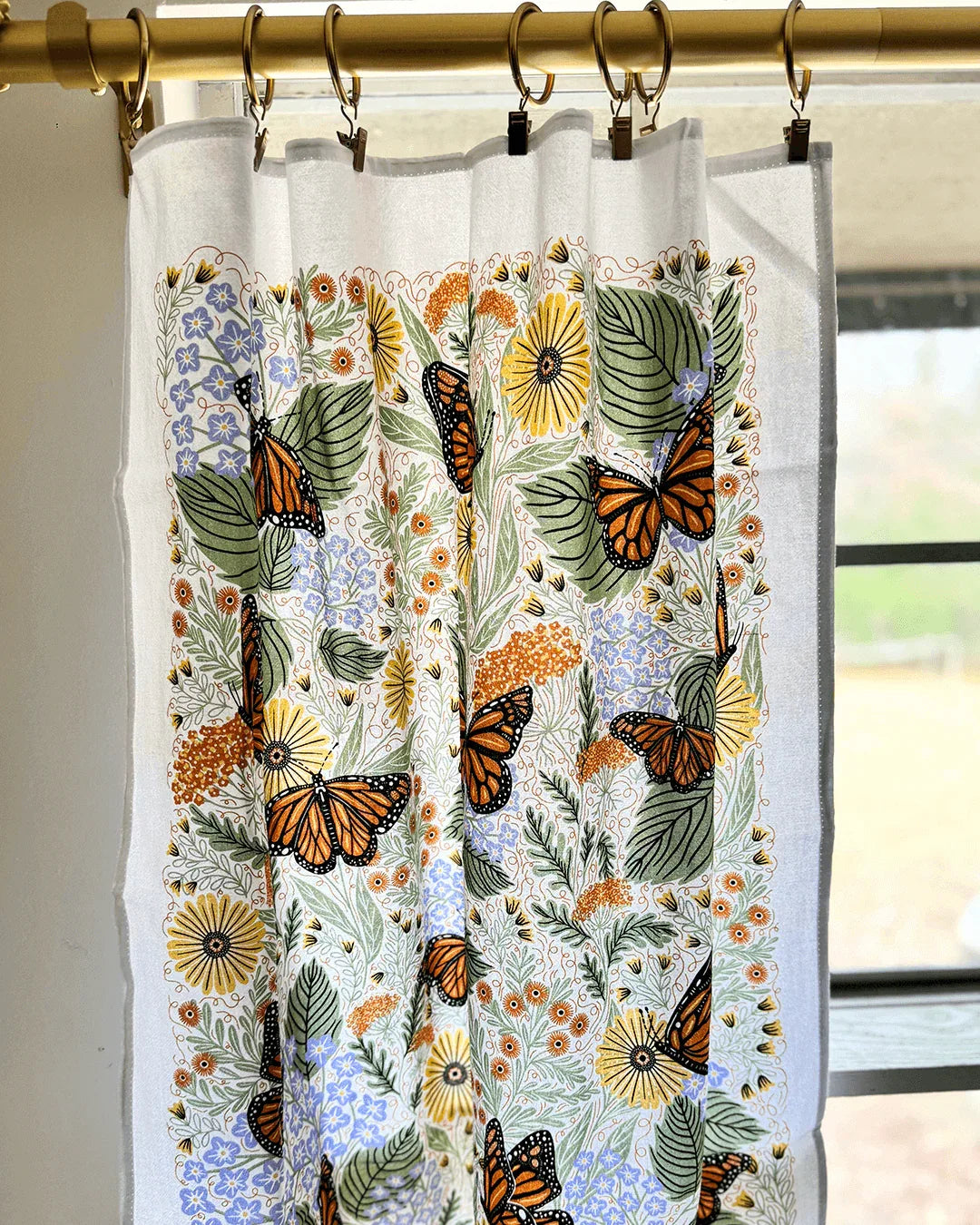 set of two tea towels with butterfly and floral illustrations