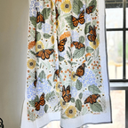 set of two tea towels with butterfly and floral illustrations