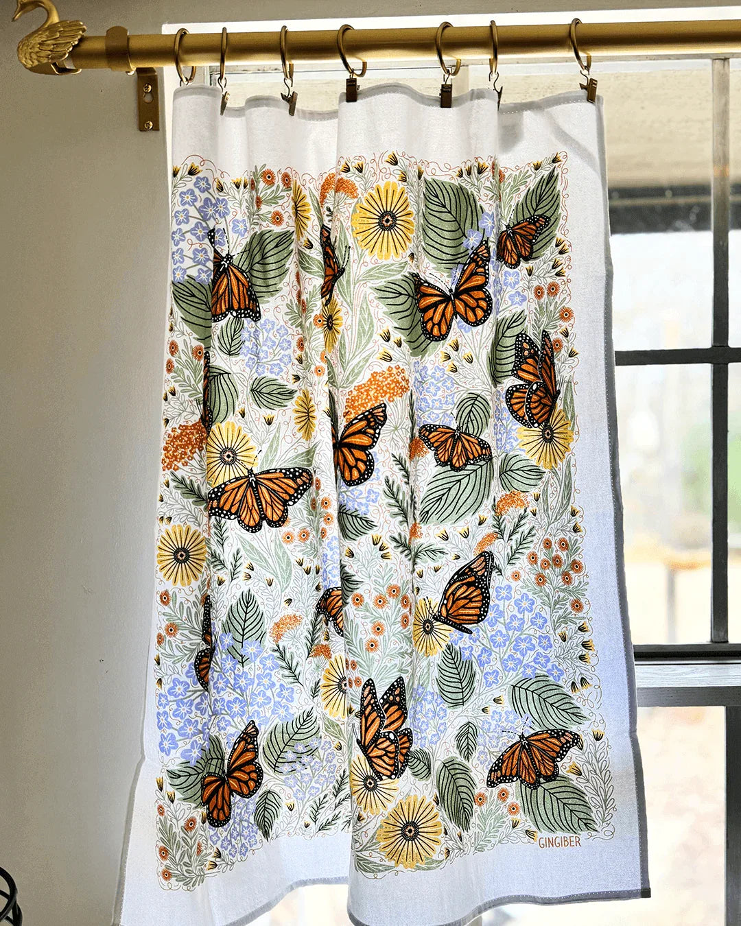 set of two tea towels with butterfly and floral illustrations