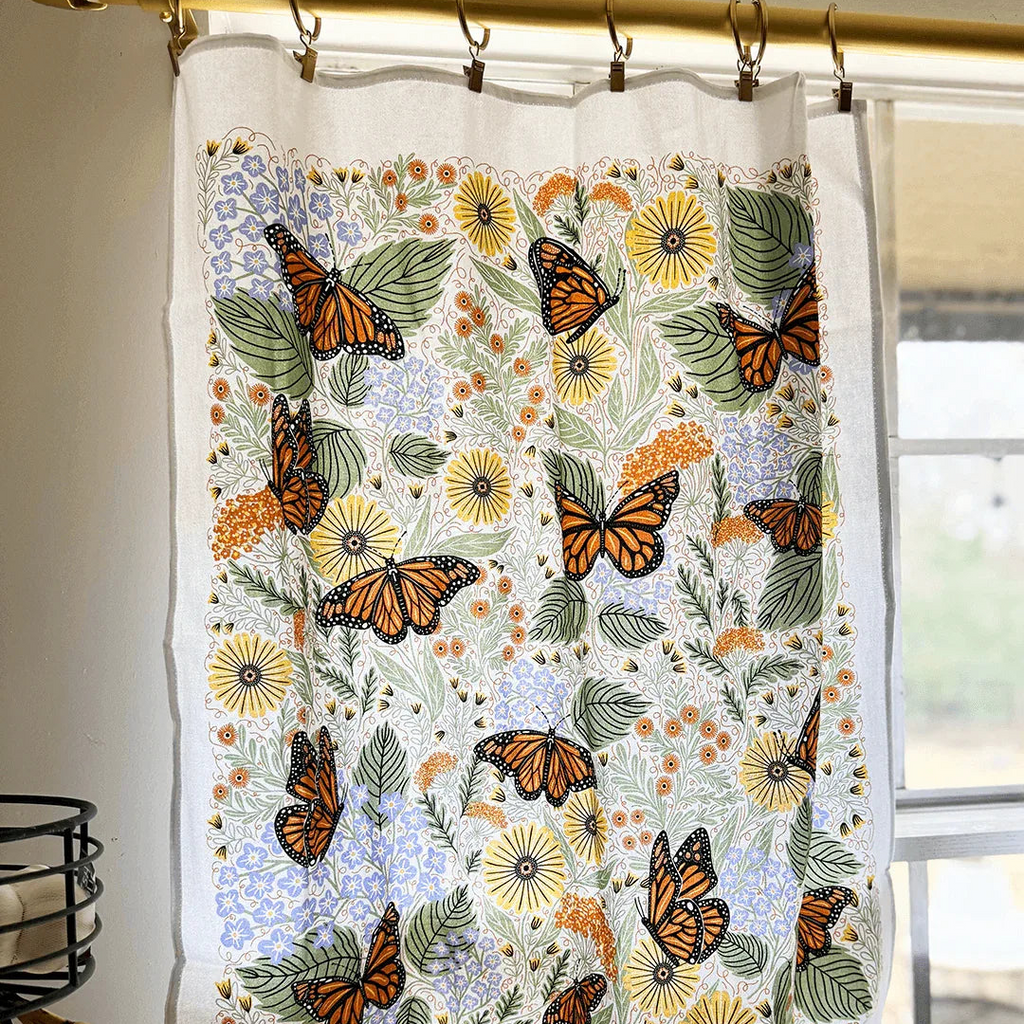 set of two tea towels with butterfly and floral illustrations
