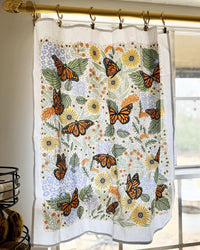 set of two tea towels with butterfly and floral illustrations