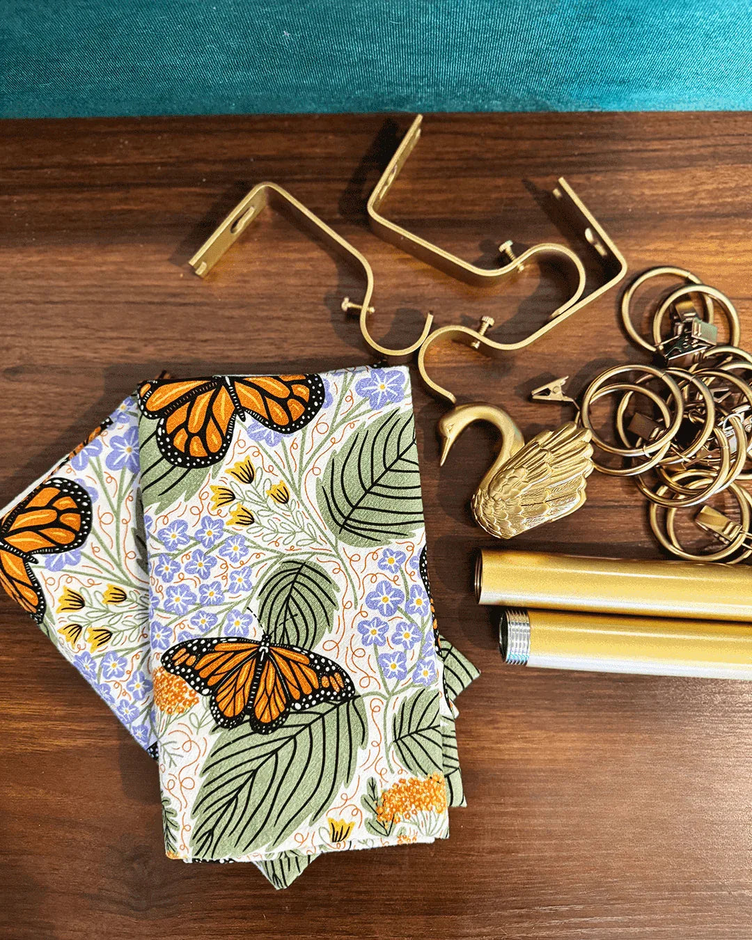 set of two tea towels with butterfly and floral illustrations