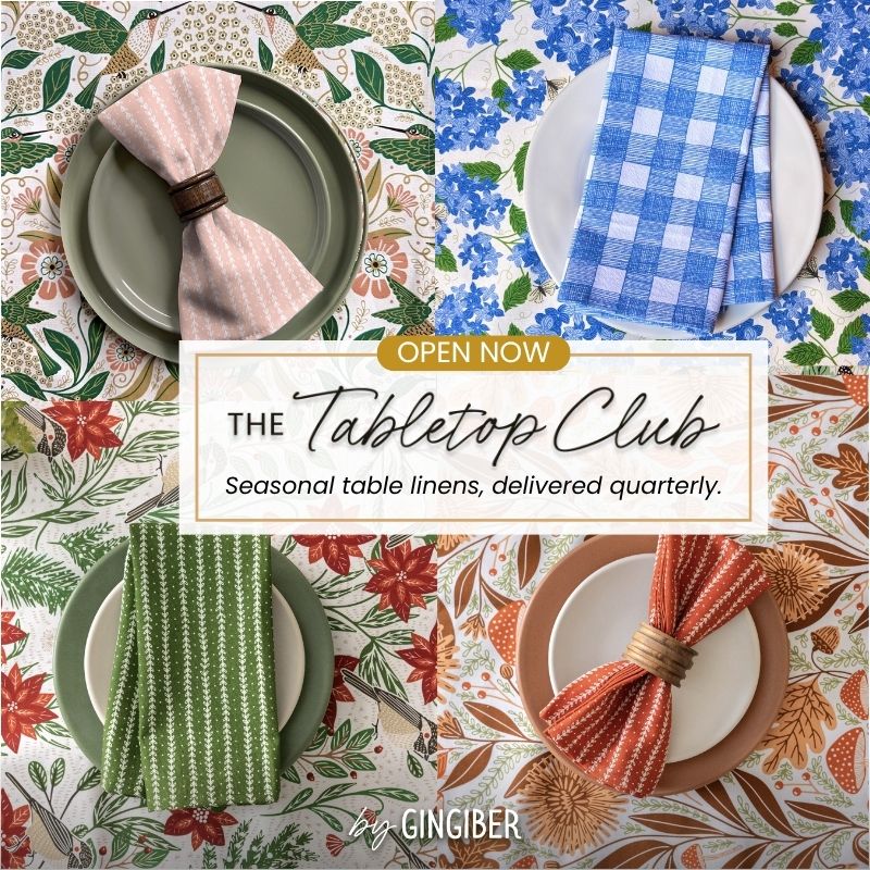 A promotional collage for The Tabletop Club showing four coordinated table linen sets arranged on floral tablecloths. Each set includes a folded napkin tied with a ring: a blush pink gingham, a blue-and-white gingham, a green-and-white striped pattern, and an orange-red gingham.