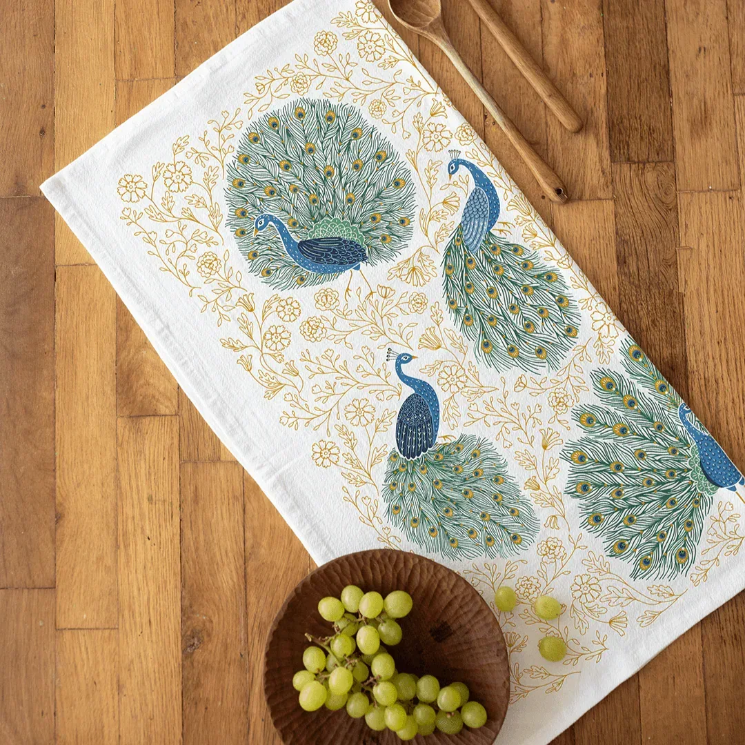 tea towel with peacock illustrations