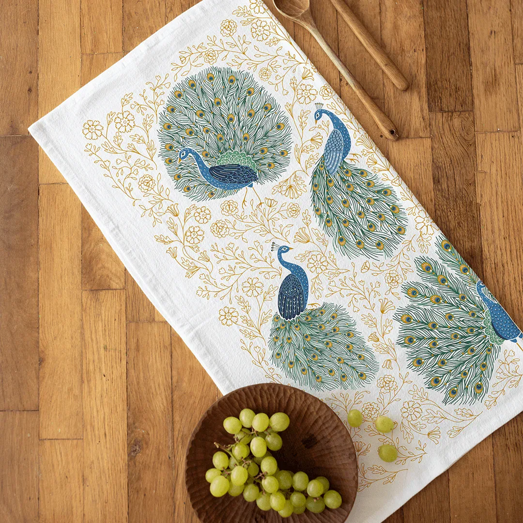 tea towel with peacock and floral illustrations